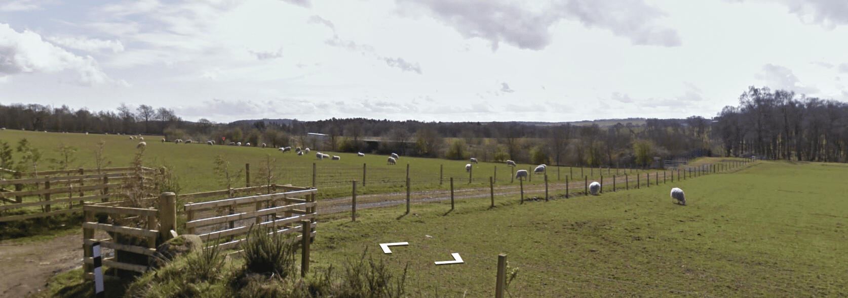 Street view of the land and surrounding fields